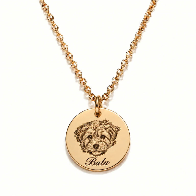 Custom engraved dog portrait necklace in gold featuring the dog's name