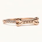 Rose gold personalized bone ring engraved with LUNA and zirconia accents