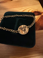 Customer photo of a personalized pet portrait bracelet with Laki engraving